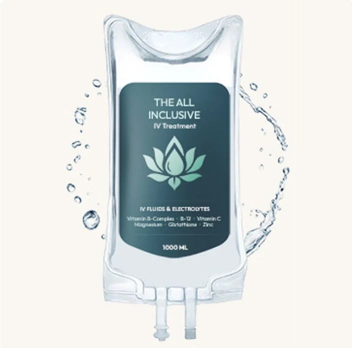 Clear IV bag labeled The All Inclusive IV Treatment with lotus logo, surrounded by water splashes, 1000ml capacity